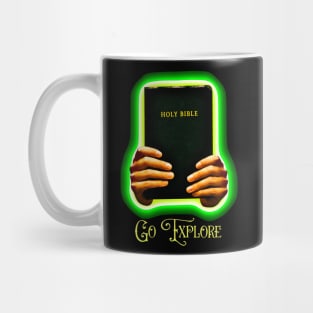 Hand holding holy bible with go explore text design Mug